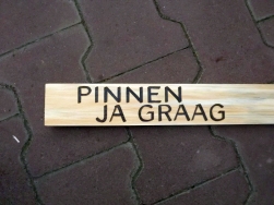 houten plank met tekst